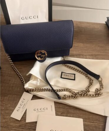 Pre-Loved Gucci Pochette en Cuir Interlocking